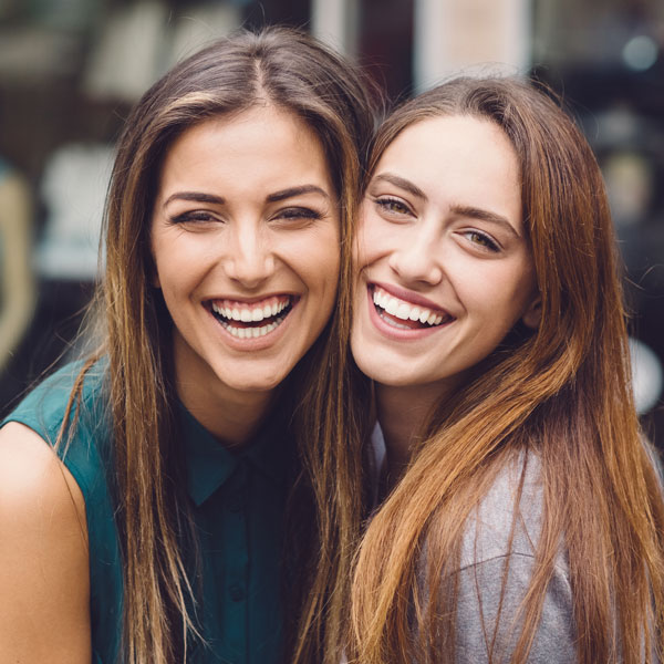 sisters laughing