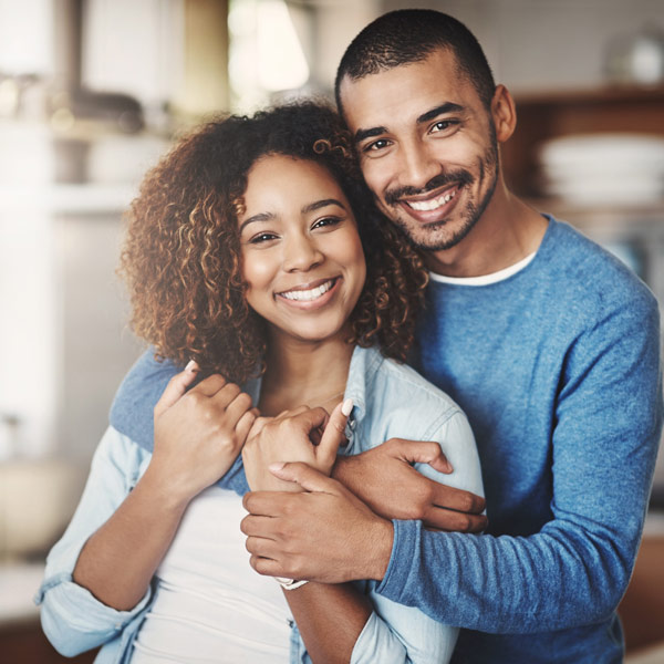 young couple smiling