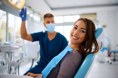 A dental patient preparing for a cosmetic smile transformation in Columbus, OH