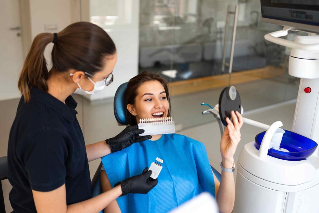 A patient reviewing veneer color options before treatment in Columbus, OH